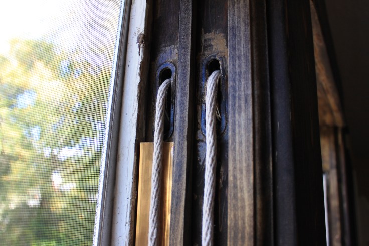 Showing sash cords, pulleys, and weather stripping